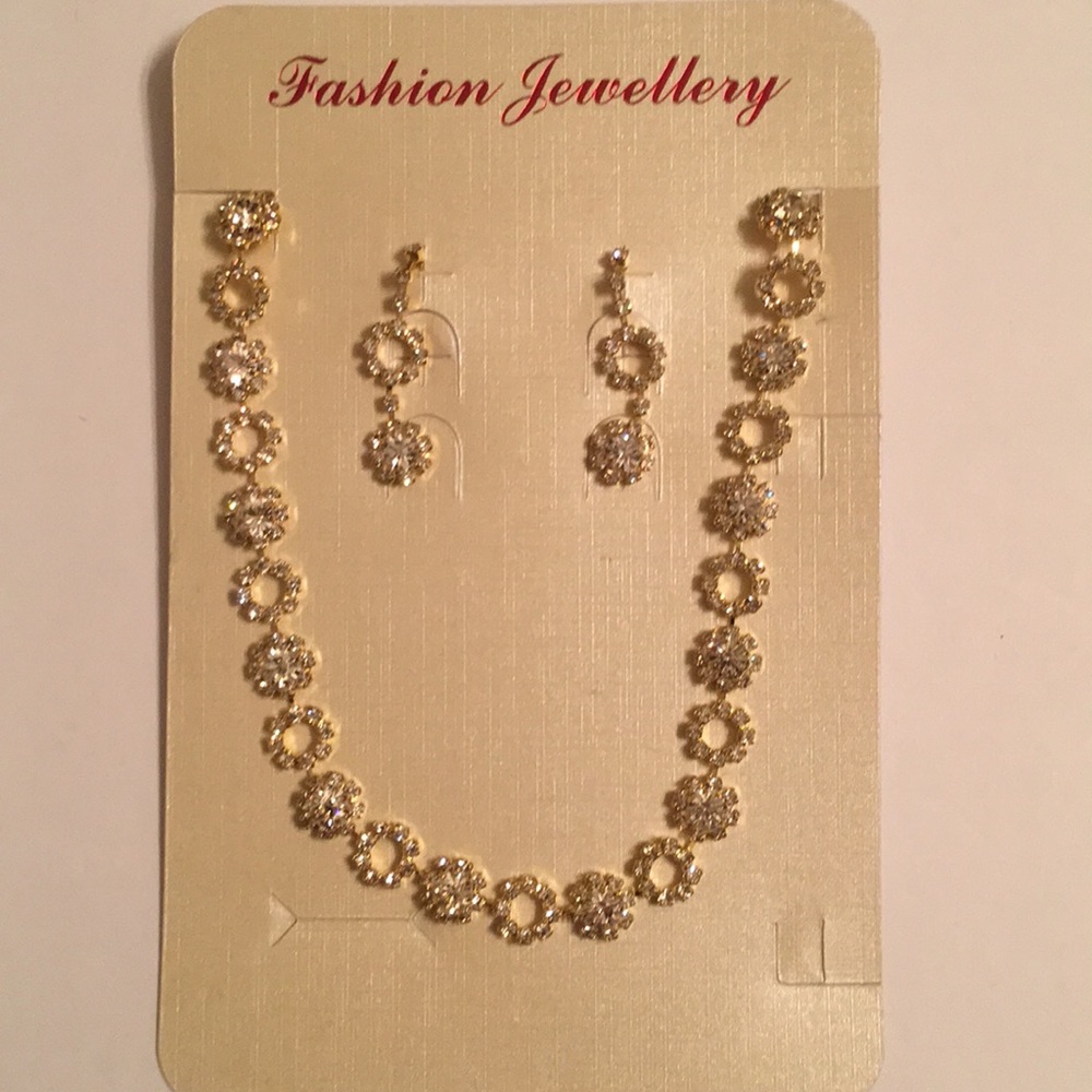 Gold and rhinestone necklace and earrings set